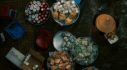 Food vendors display their wares at a market.